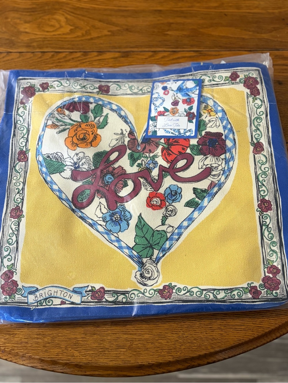 Brighton “Tied with Love” Canv Floral Bird Tote Tag — Blue, Yellow & Red Accents